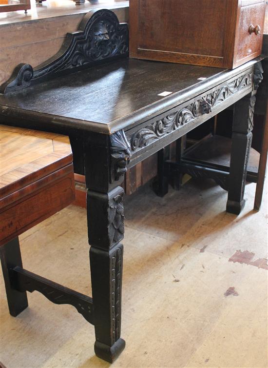 Carved oak side table